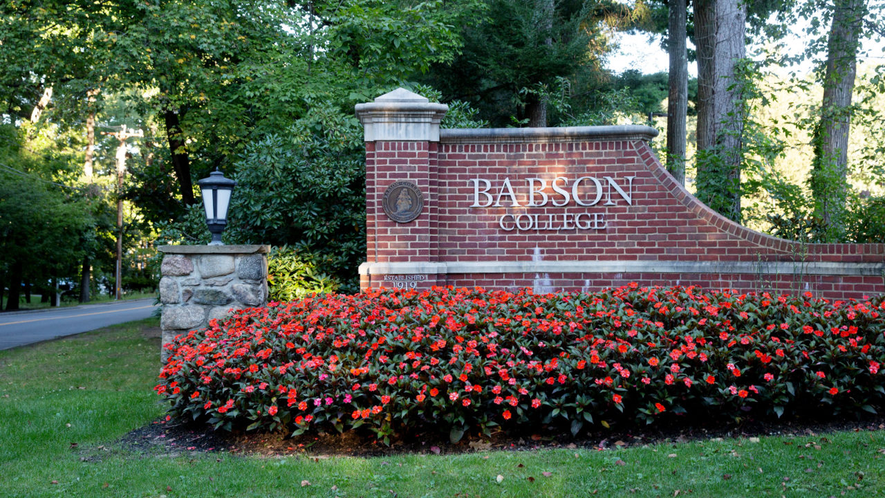 Babson College appears on brick entry gate