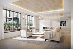 The Bristol Wellesley Lobby with white couch and club chairs, chandelier, fireplace, large windows and ceiling feature.