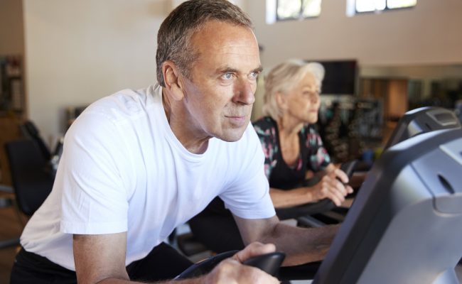 Fitness Center: Man and woman working out